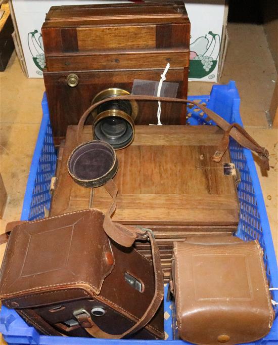 Mahogany field camera (unmarked), with Bauz rectilinear lens, dark slides. etc. and two box cameras